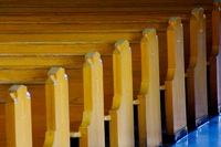 Empty church pews, illustrating Britain's drastic decline in belief in God.